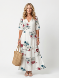 VELTASSINO | Midi-Kleid Élina mit Blumenmuster und Pompons